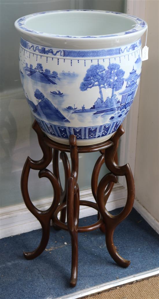 A blue and white Oriental bowl on stand